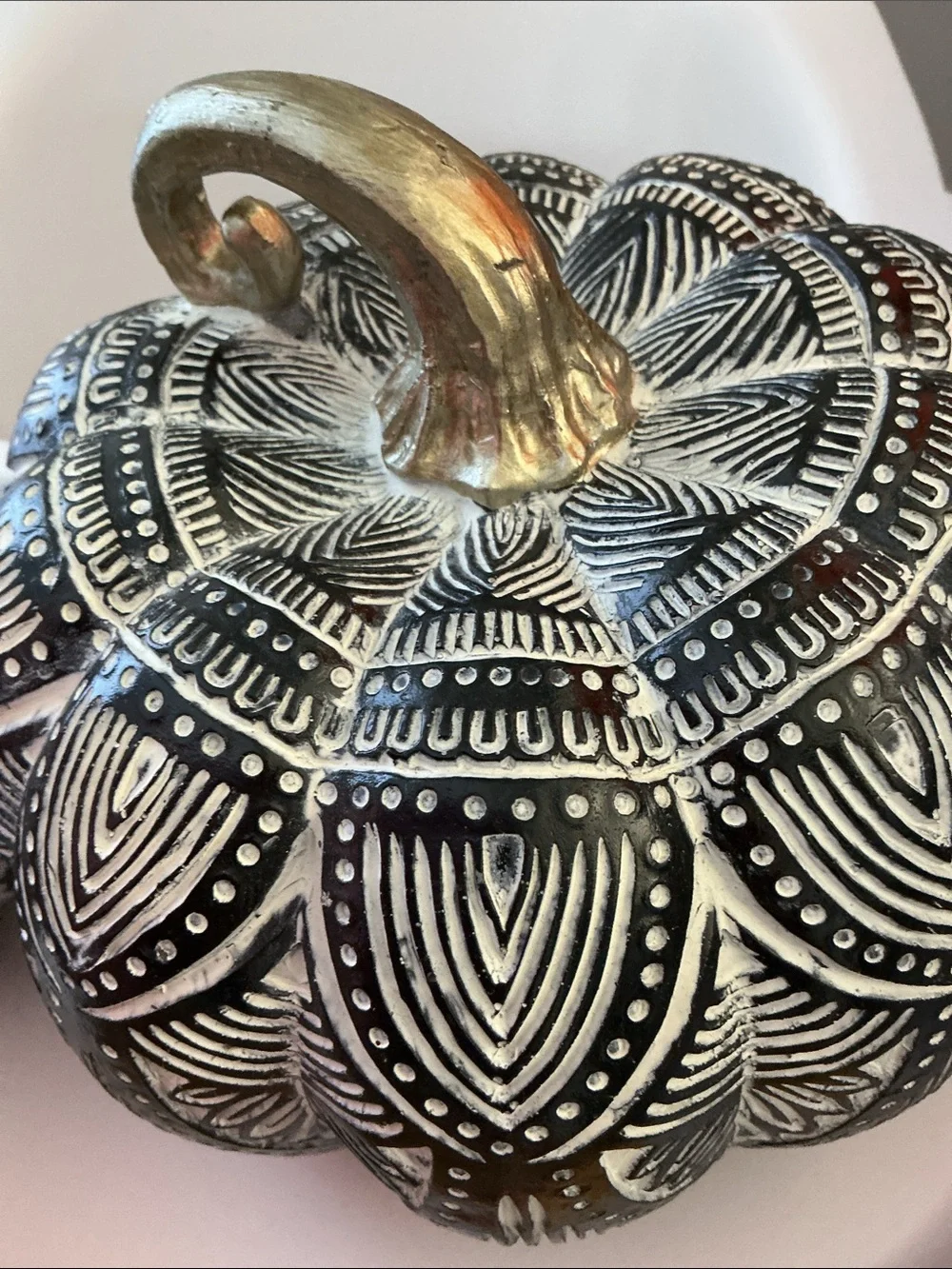 Pumpkins , featuring intricate black-and-white pattern metallic  stems.